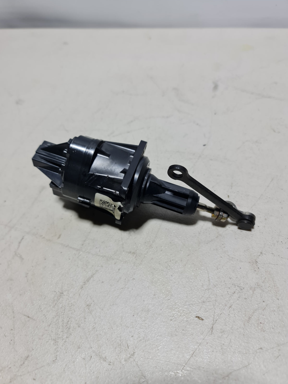 BMW turbo charger solenoid actuator WT32 K6T51075 for 2009-2015 models, showing the black actuator with connectors and labels.