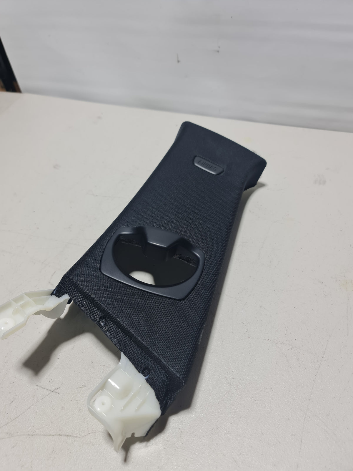BMW 4 Series F32 passenger right side center pillar trim cover, black plastic interior part with mounting clips.