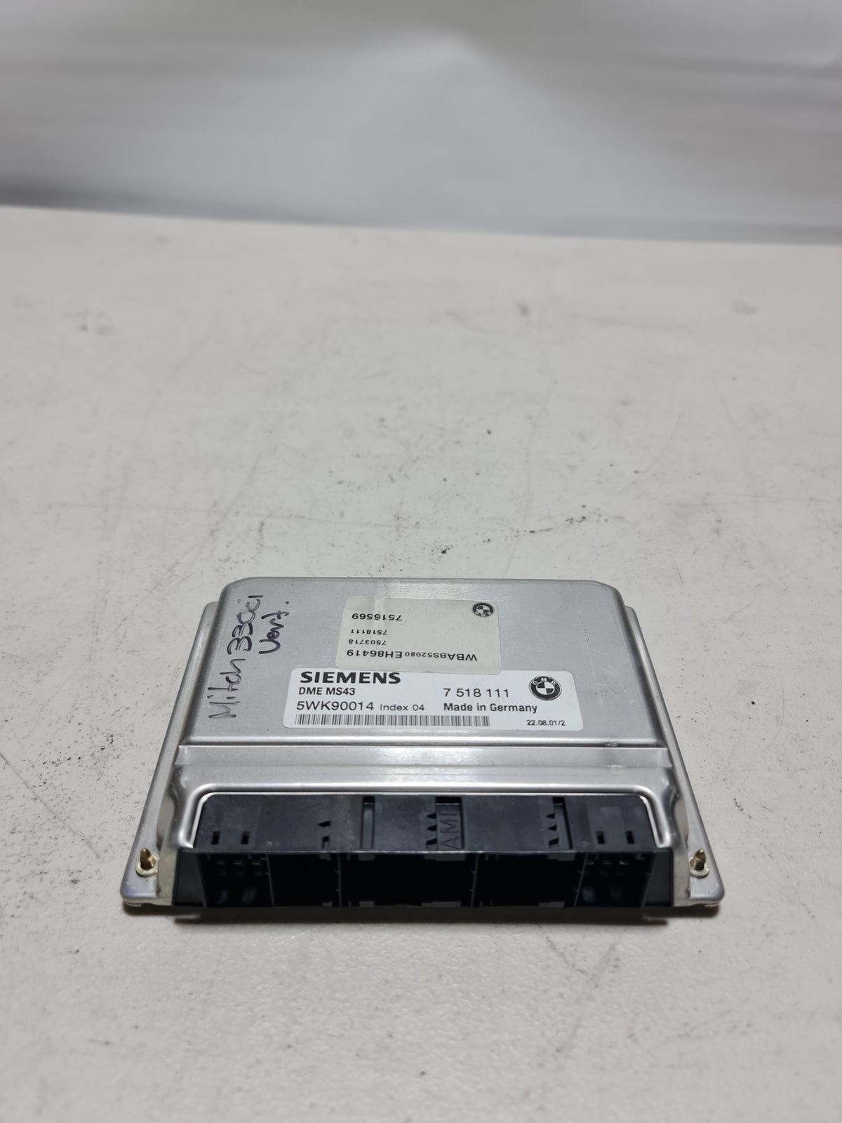 BMW Z3, X5, E36, E46, E39, E53 3.0i M54 engine ECU DME MS43 EWS control unit, black rectangular module with connectors.