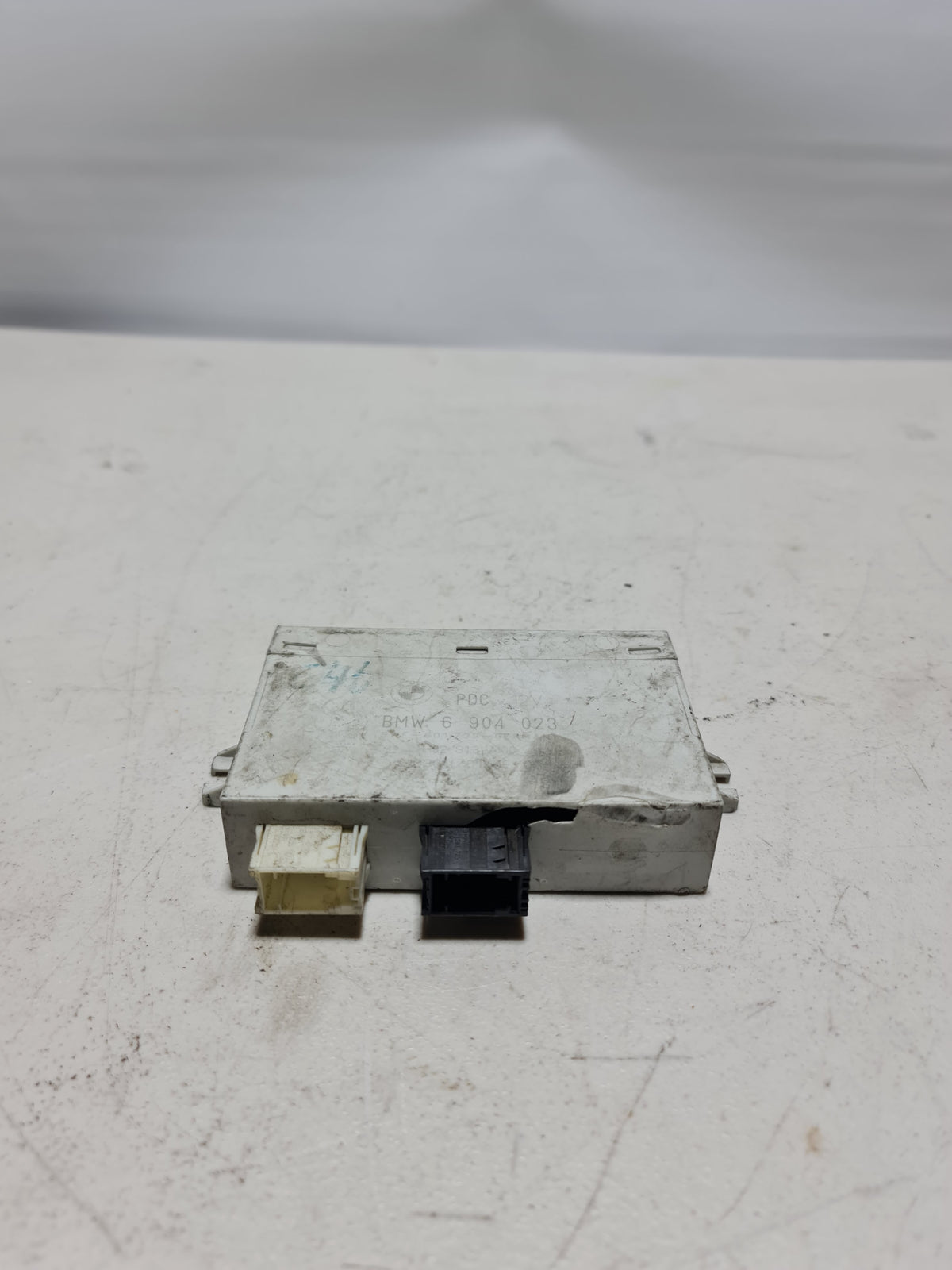 BMW control unit for active PDC system, model 66-21-6-904-023, shown in image with connectors and circuit board details.