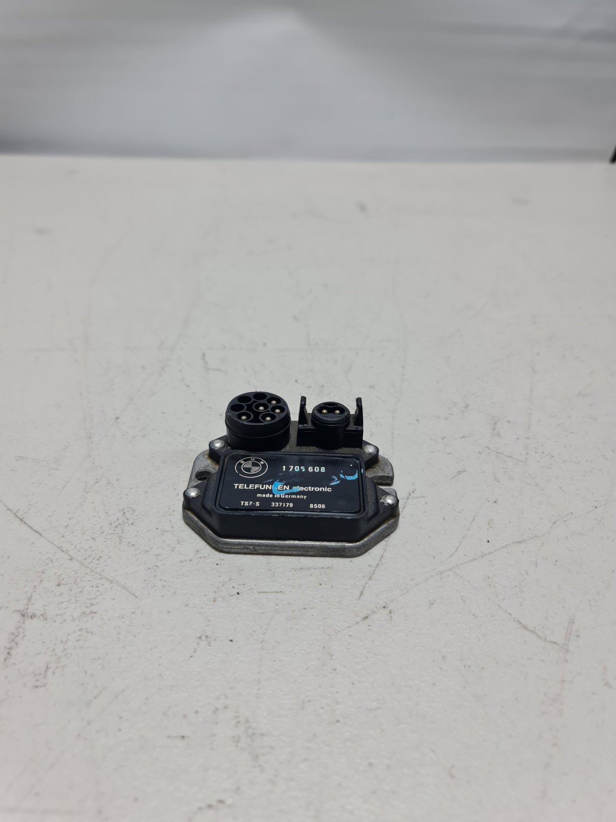 BMW 318i control unit transitorized ignition for 1984-1985 models, part number 12-14-1-705-608, showing the electronic ignition module.