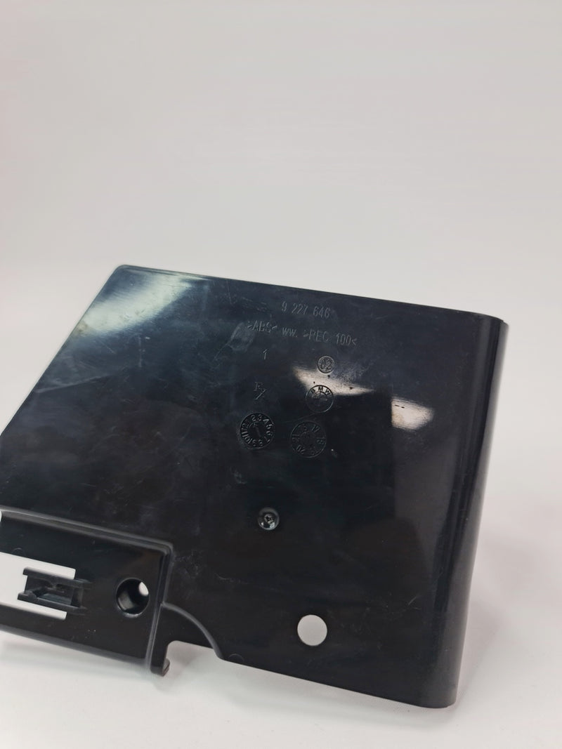 BMW F30 335i Active Hybrid FEM control unit cover showing the black plastic cover with branding details.