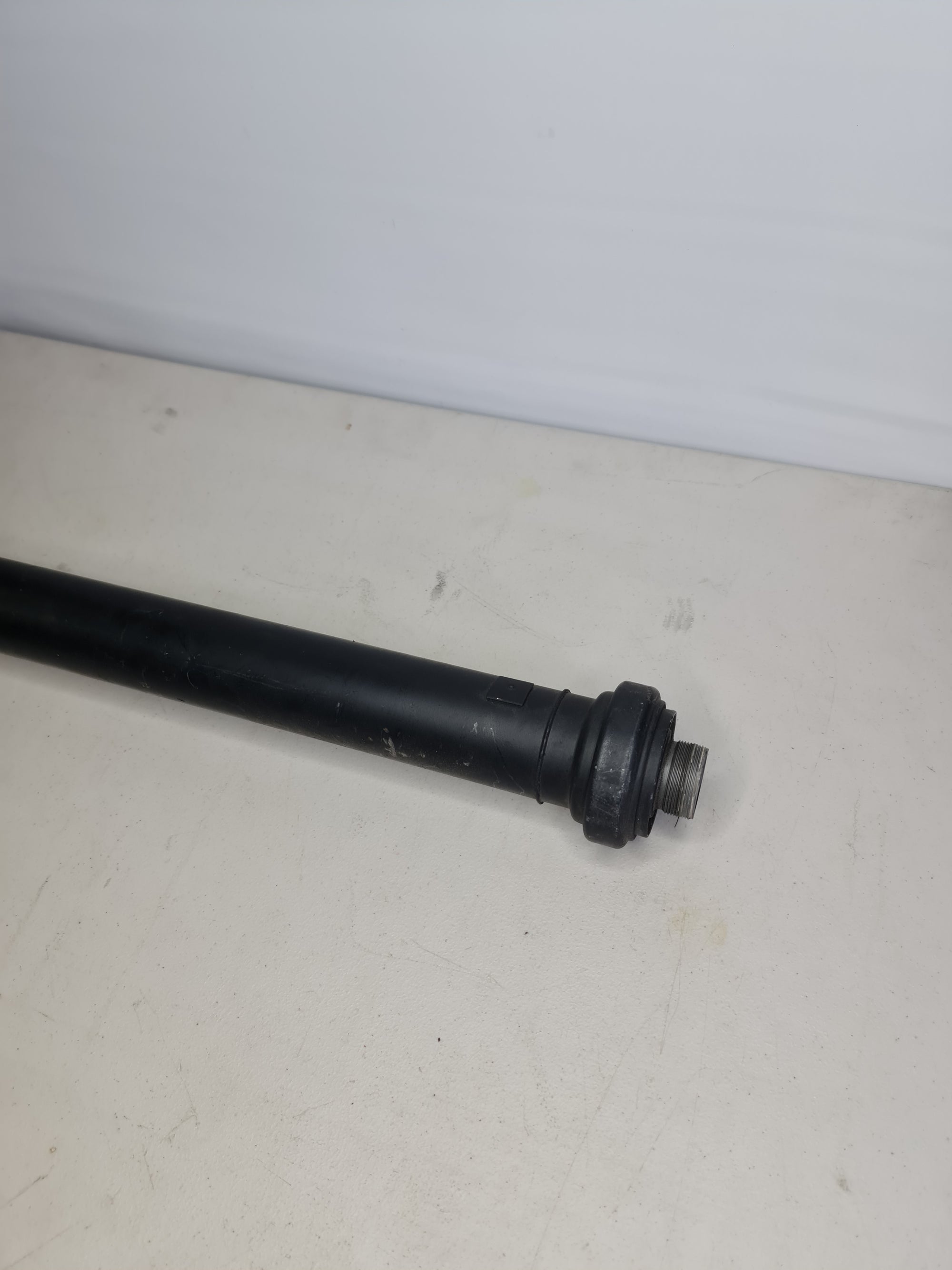 BMW drive shaft for 2016-2020 models, part number 26-11-8-090-631, showing the metal shaft with universal joints.
