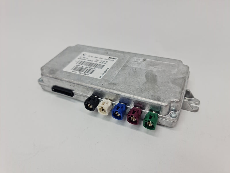 BMW M2 Series F22 ECU for top rear side view camera, showing the compact electronic control unit and wiring connections.