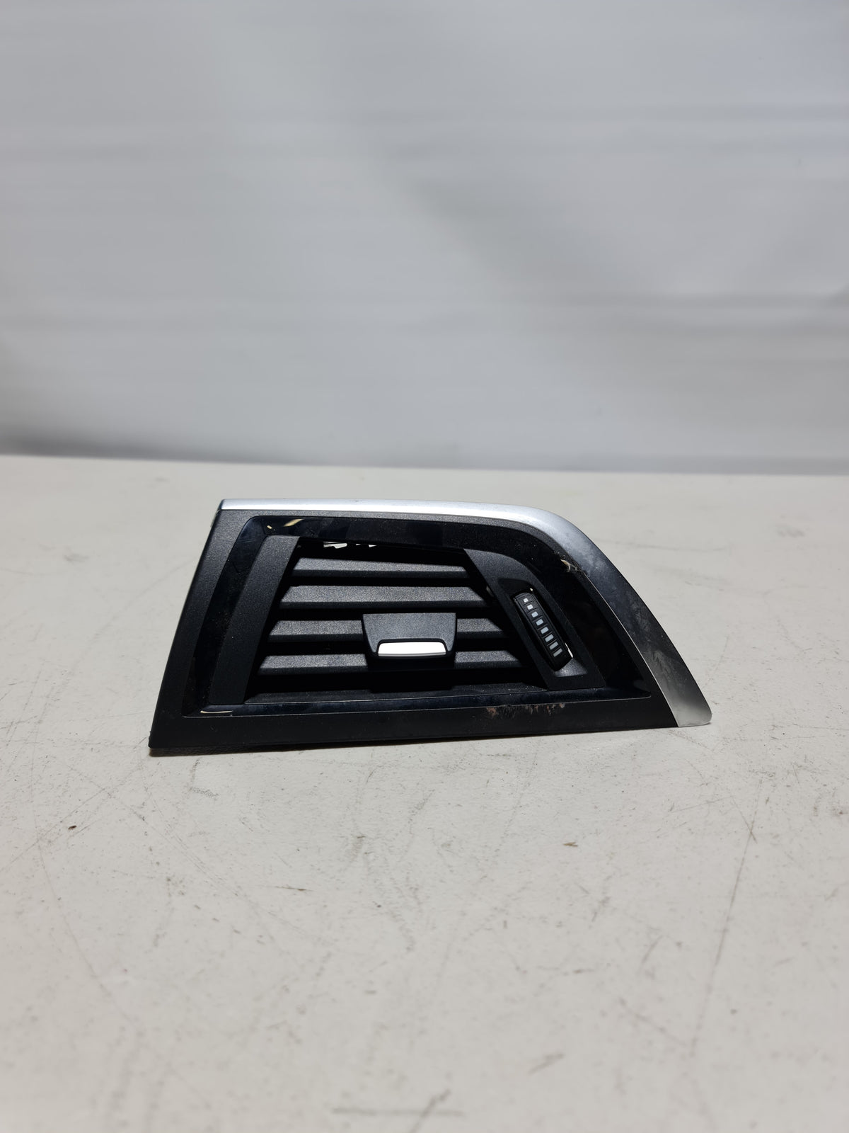 BMW 2014-2020 fresh air grille left side, genuine OEM part with model number 64-22-9-205-355, for vehicle airflow intake