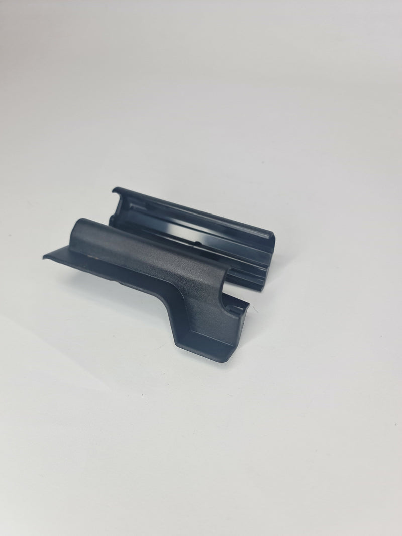 Mercedes-Benz C W205 front left seat rail cover, interior part A2059190700, showing the seat track corner and connection details