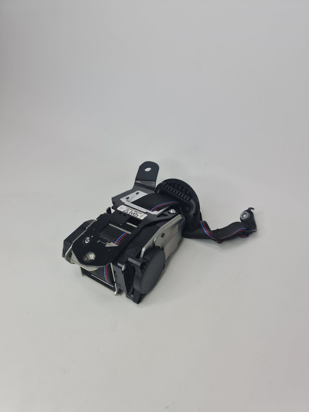 BMW M3 F80 front right seatbelt, safety restraint with black strap and metal buckle, designed for vehicle safety and fitment.