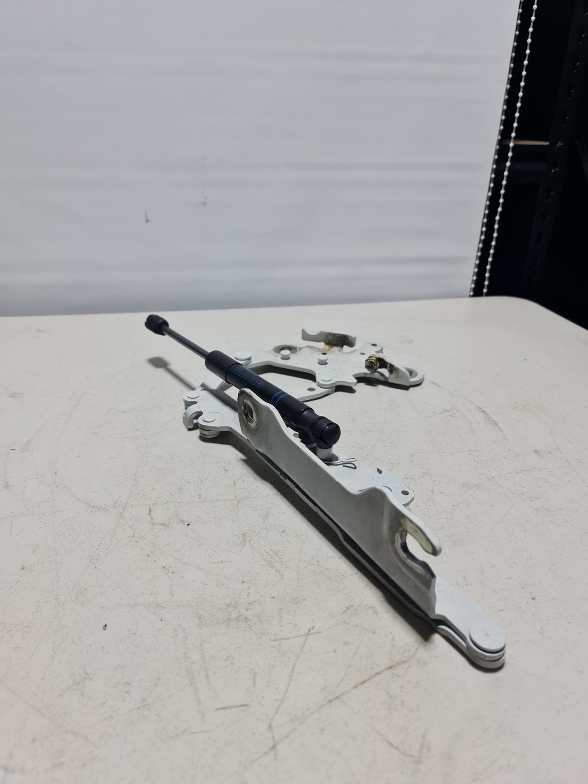BMW F30 front right bonnet hinge gas strut for 3 Series F30, genuine OEM hood support component with metal and rubber parts.