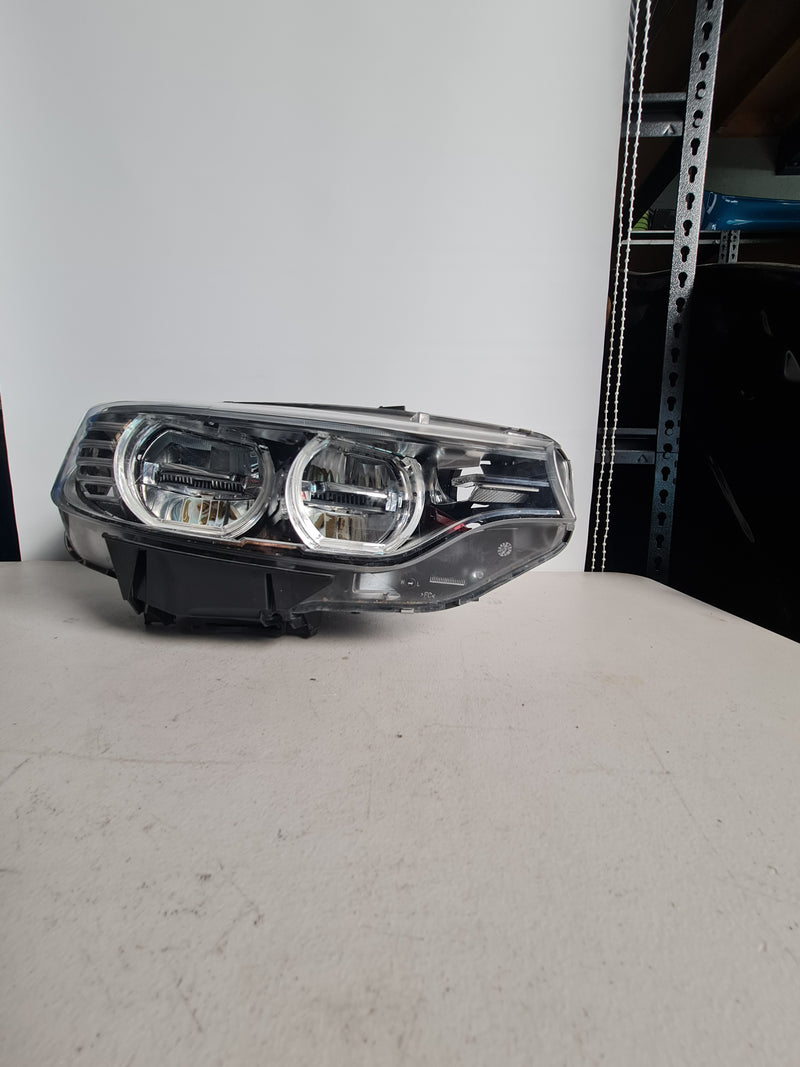 BMW 4 Series F32 F33 F36 F82 F83 driver side adaptive LED headlight with detailed lens and housing visible.