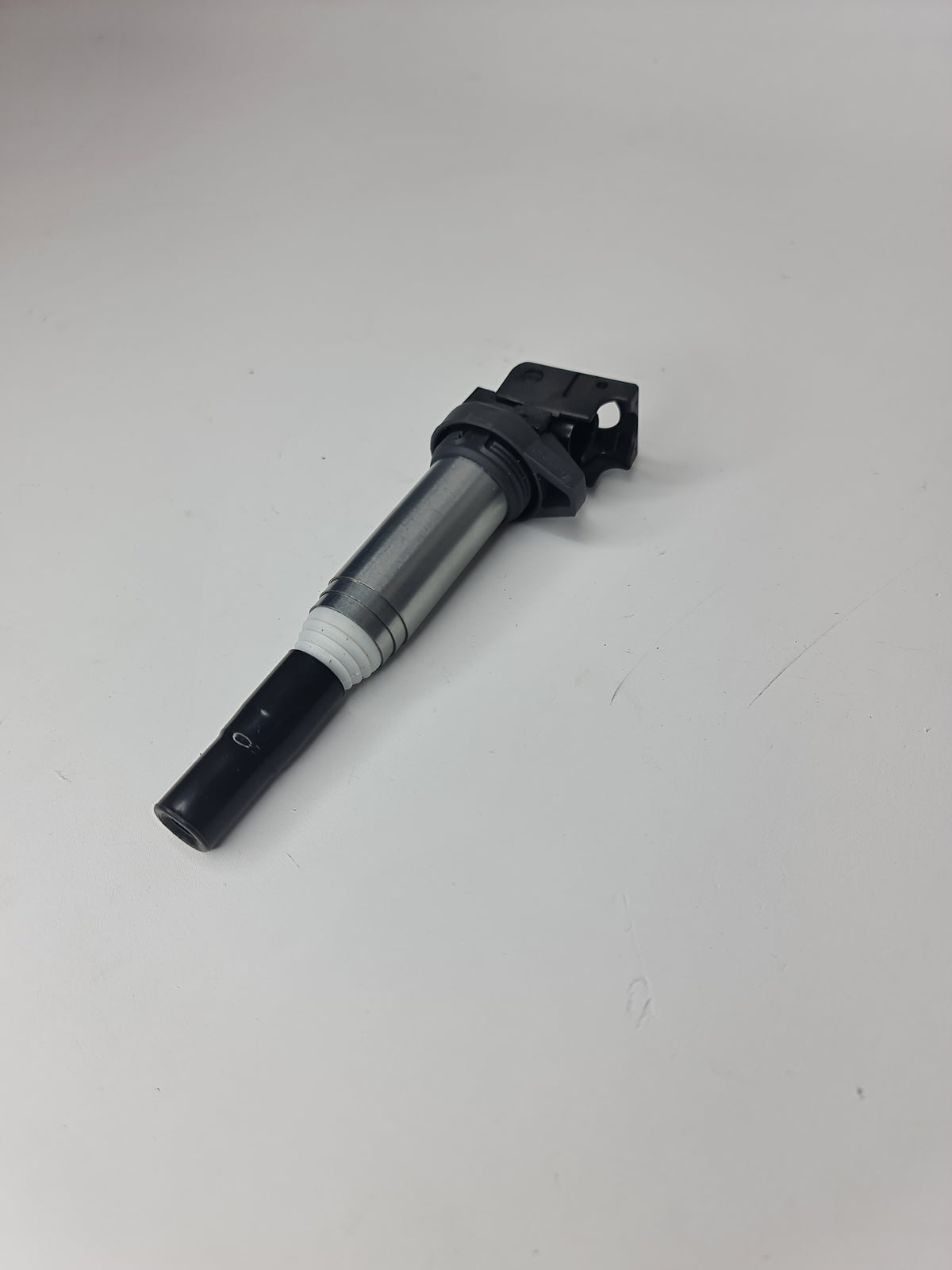 BMW ignition coil for models 2001-2020, part number 12-13-8-616-153, shown in a close-up view of the auto part.