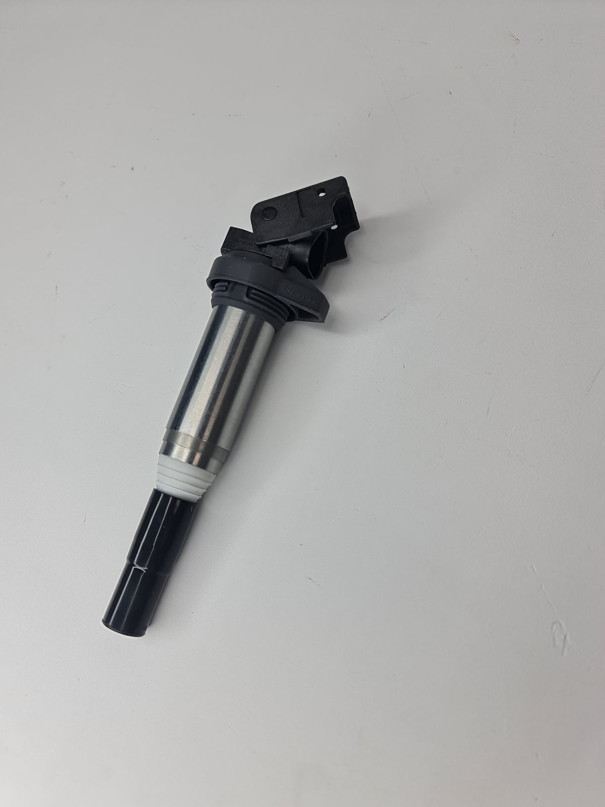 BMW ignition coil for 2001-2020 models, part number 12-13-8-616-153, showing the coil and connector for engine ignition system.