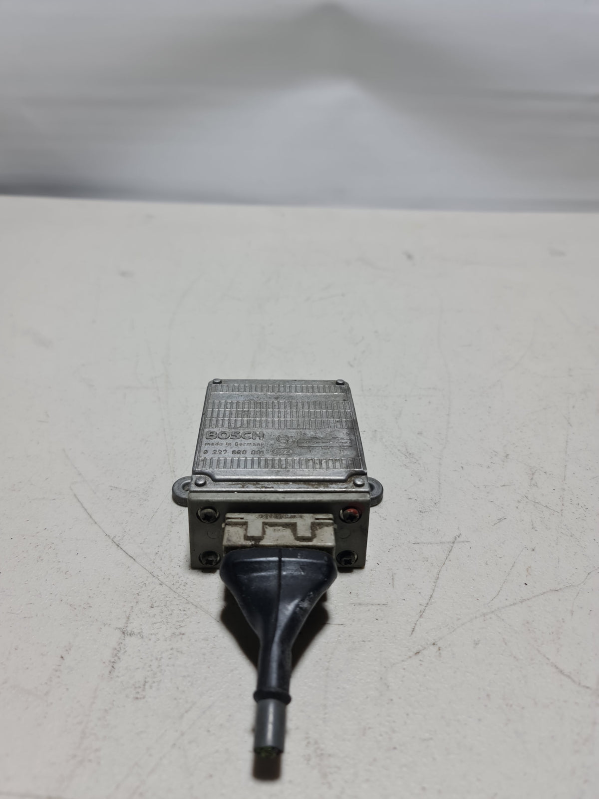 BMW ignition control unit module for E23, E24, E28 models, Bosch brand, compact electronic automotive component.