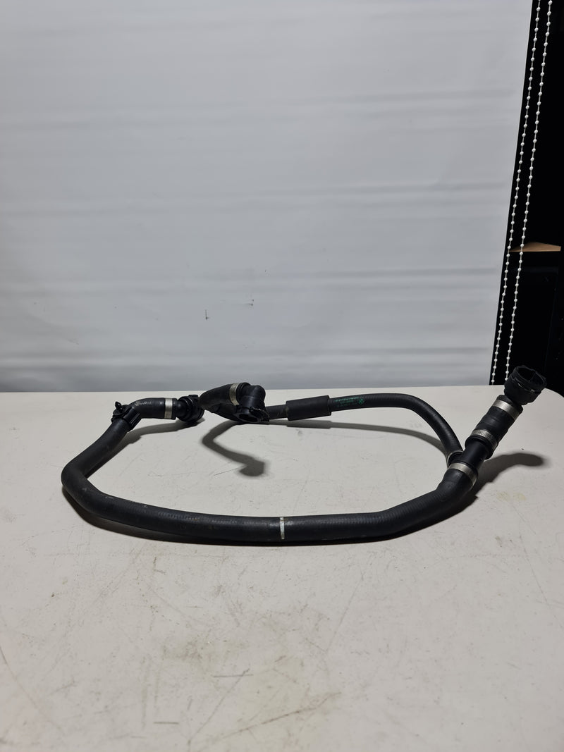 BMW coolant radiator line for 2015-2020 models, part 17-12-2-284-691, connecting radiator and engine.