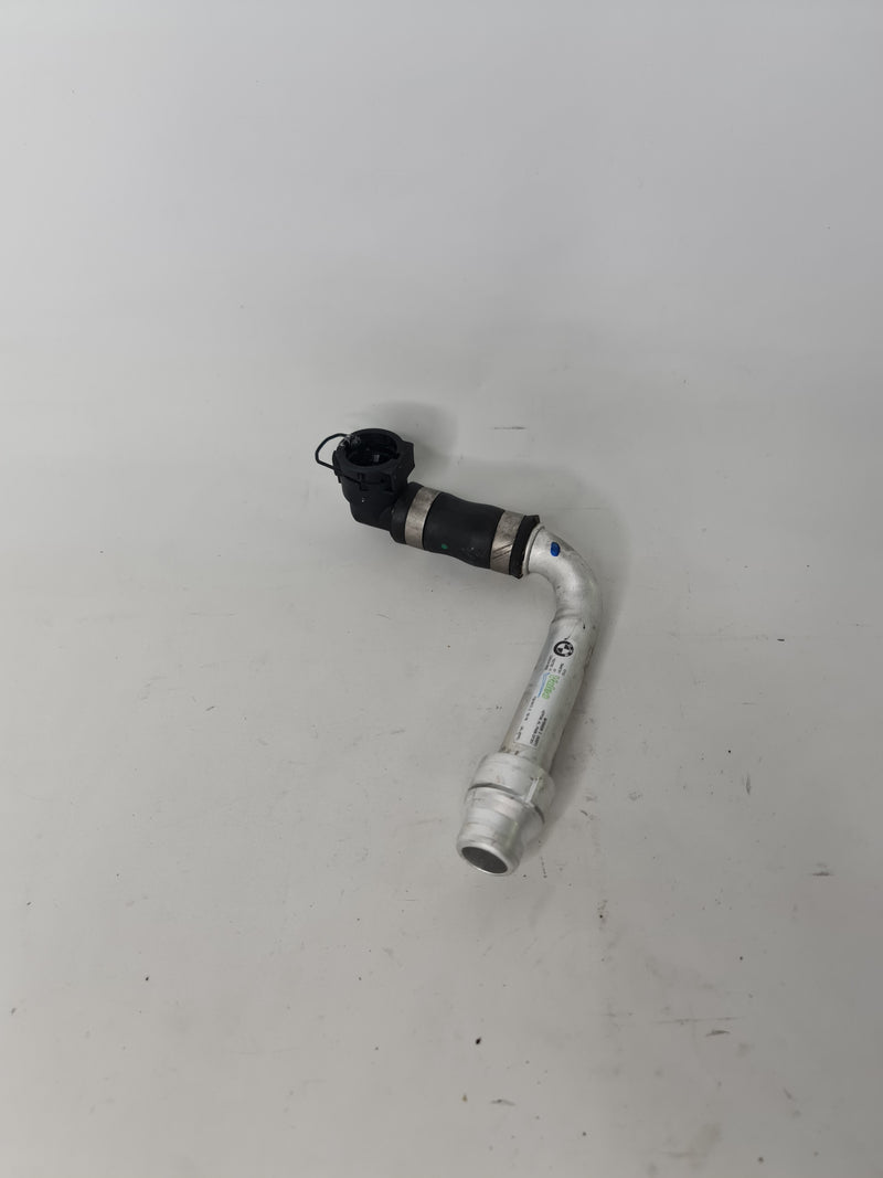 BMW low-temperature coolant radiator line for 2015-2020 models, showing the radiator and connecting hoses.