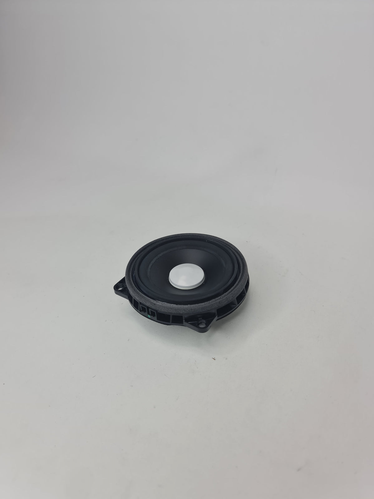 BMW mid-range speaker with Harman Kardon branding, compatible with 2012-2020 BMW models, shown in black with speaker grille.