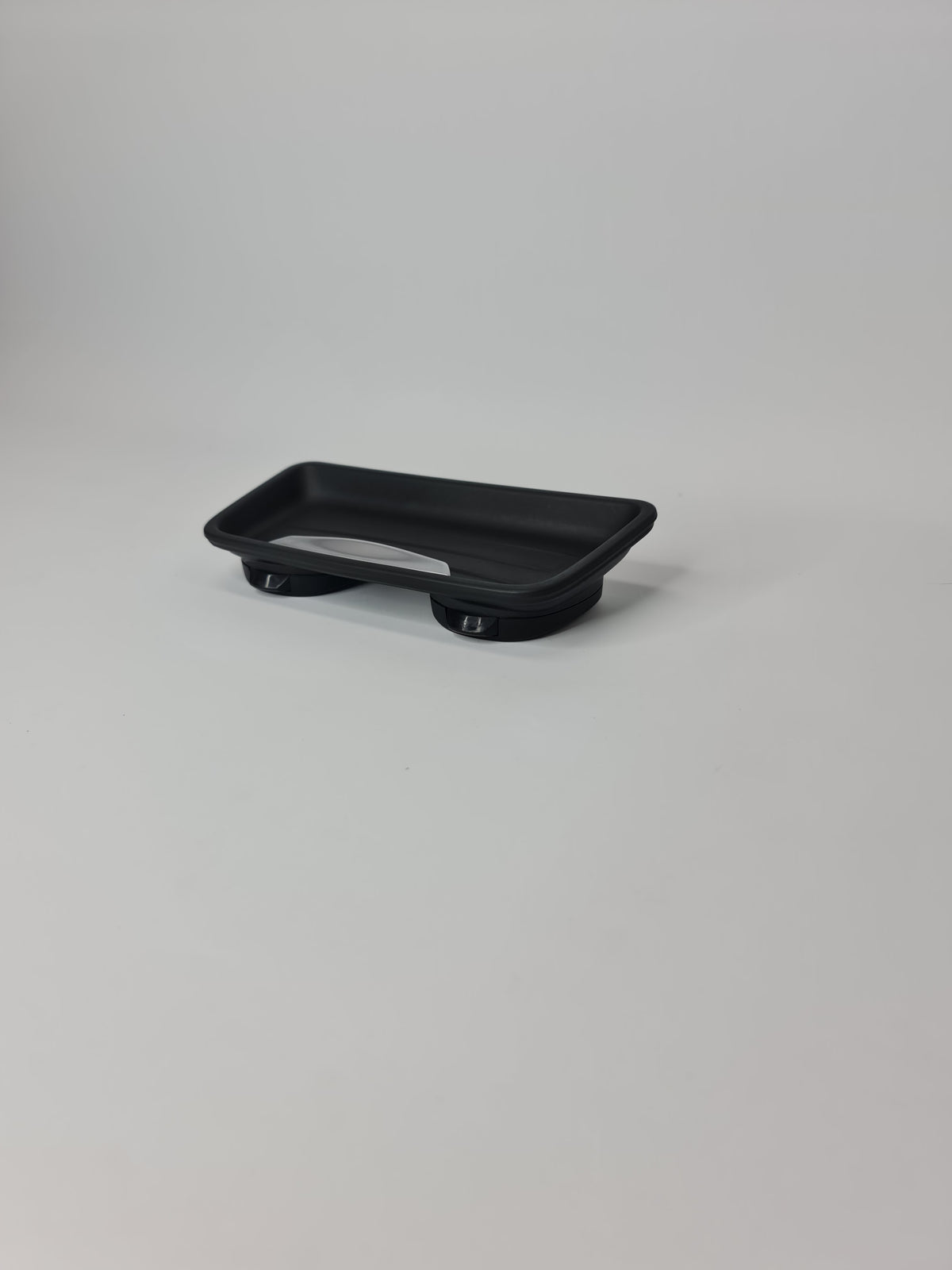 BMW oddments tray cup holder insert with multiple compartments for vehicle interior storage.