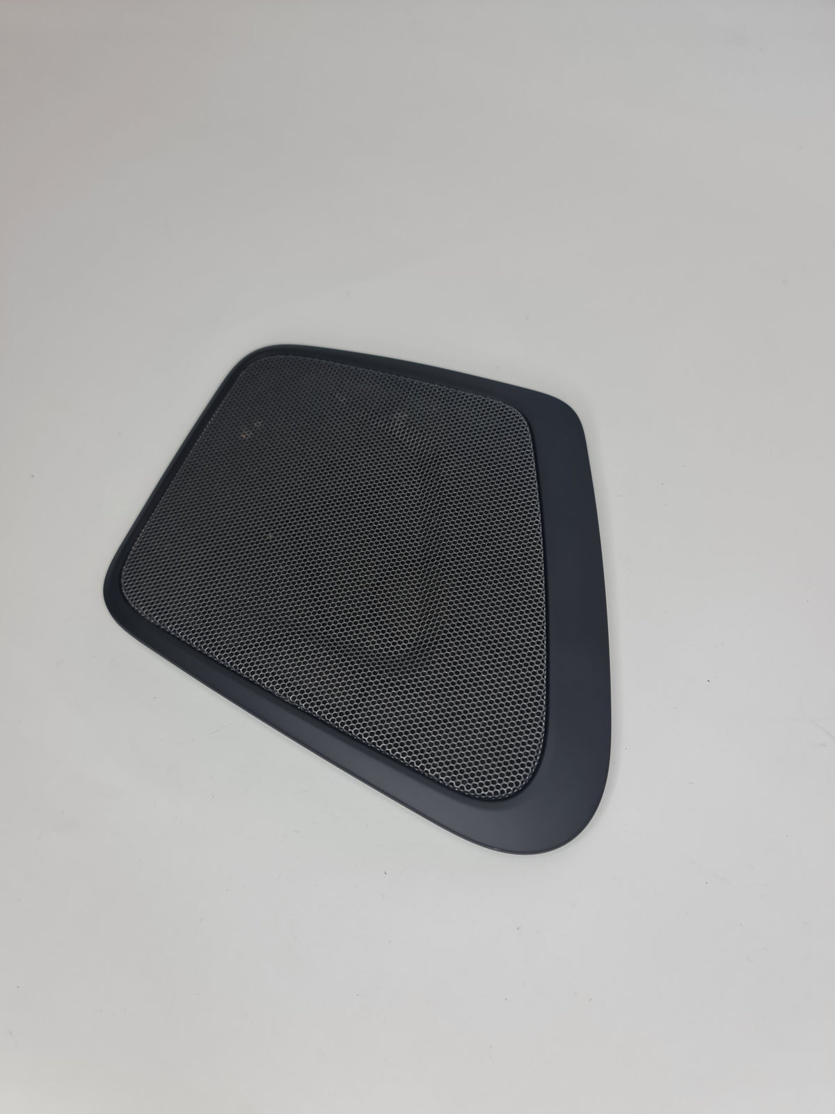 BMW F22 F23 rear right side shelf deck speaker cover trim, OEM 7921168, showing the black plastic interior car part.
