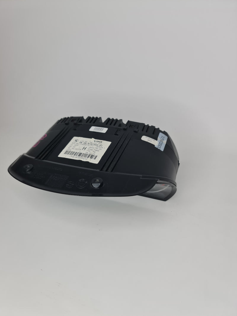 BMW 328i E90 speedometer cluster instrument measuring KPH, OEM 09-12 model with clear gauge display and digital readout.