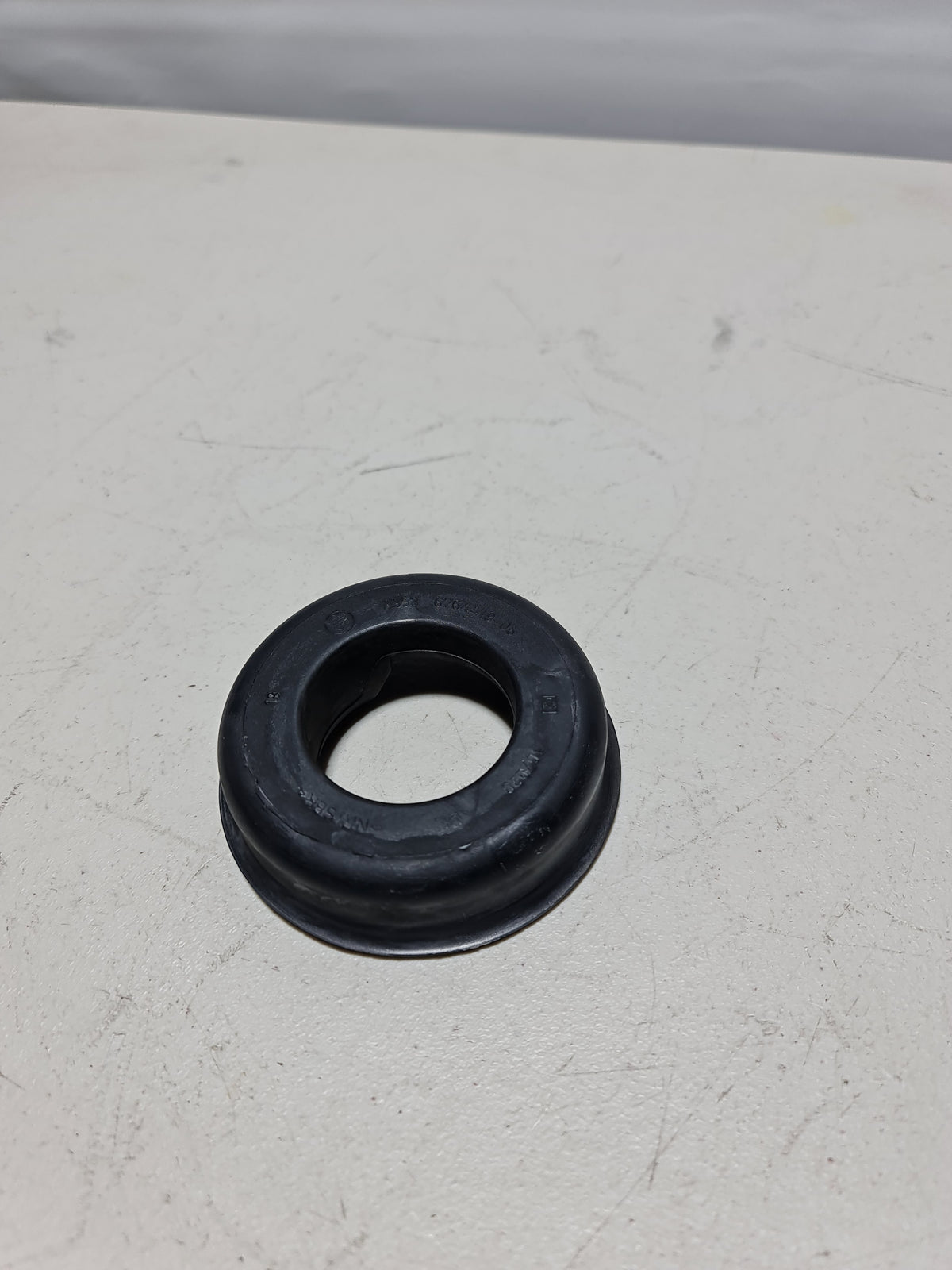 BMW 33536764419 upper spring pad for 2006-2020 BMW 3 Series, automotive suspension component, black rubber spring support pad.