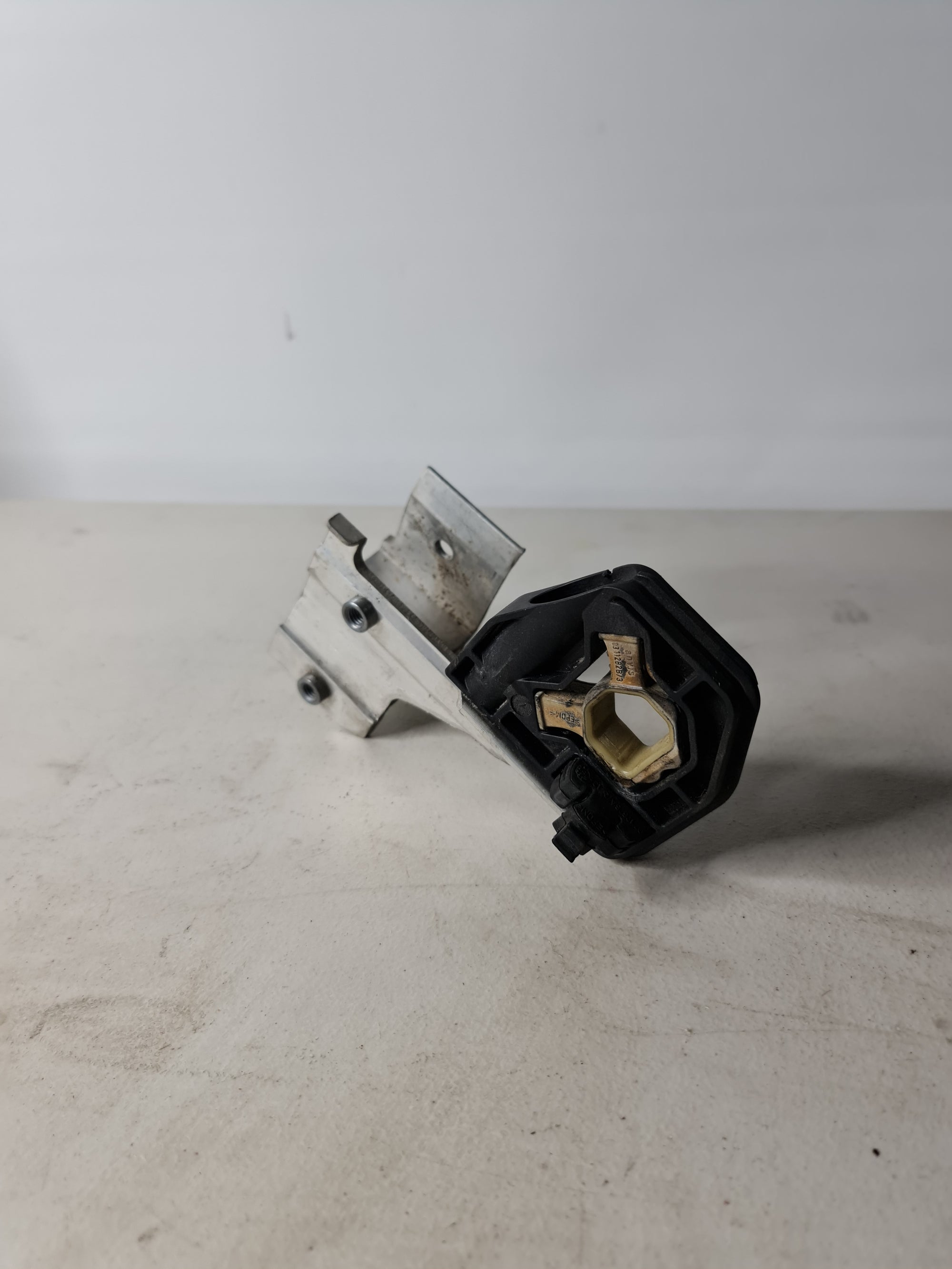 BMW Spring Retainer Plate OMC BRP 0311282, 0324824, 0314501 for engine component retention, shown in the image.