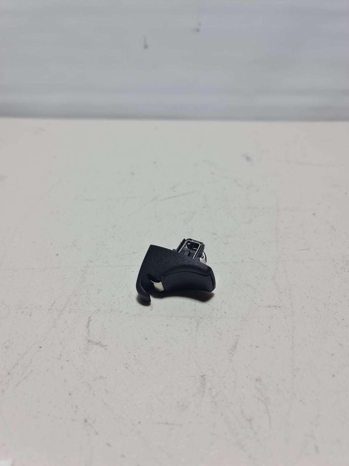 BMW 4 Series F36 sun visor holder pivot hinge clip bracket, 2019 model, showing the metal hinge and mounting points.