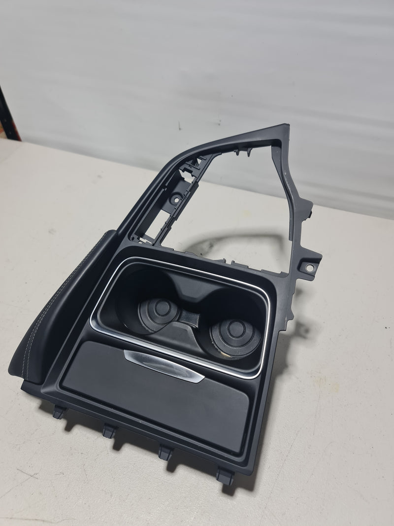 BMW F80 F82 F83 M3 M4 front center console trim cover with cup holder, part T55086, model-specific interior accessory.