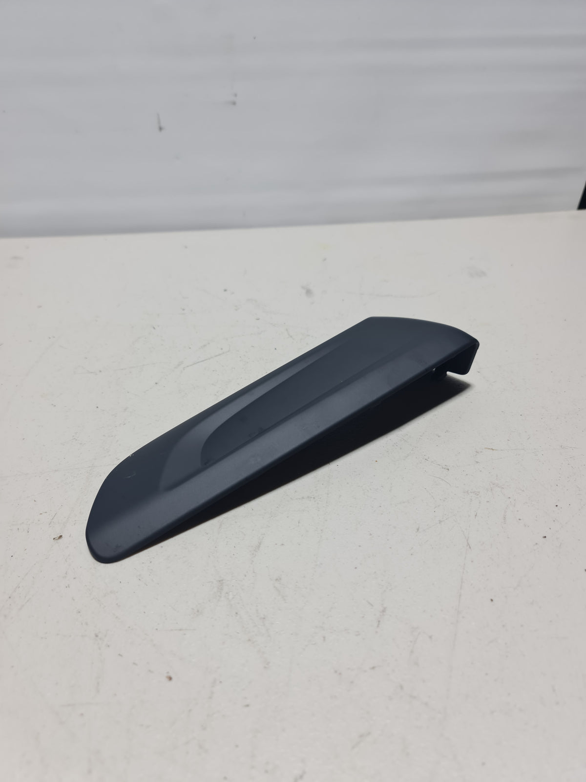 Left seat belt trim cover for BMW M4 (2015-2020), model 51438060371, with protective belt handover detail.