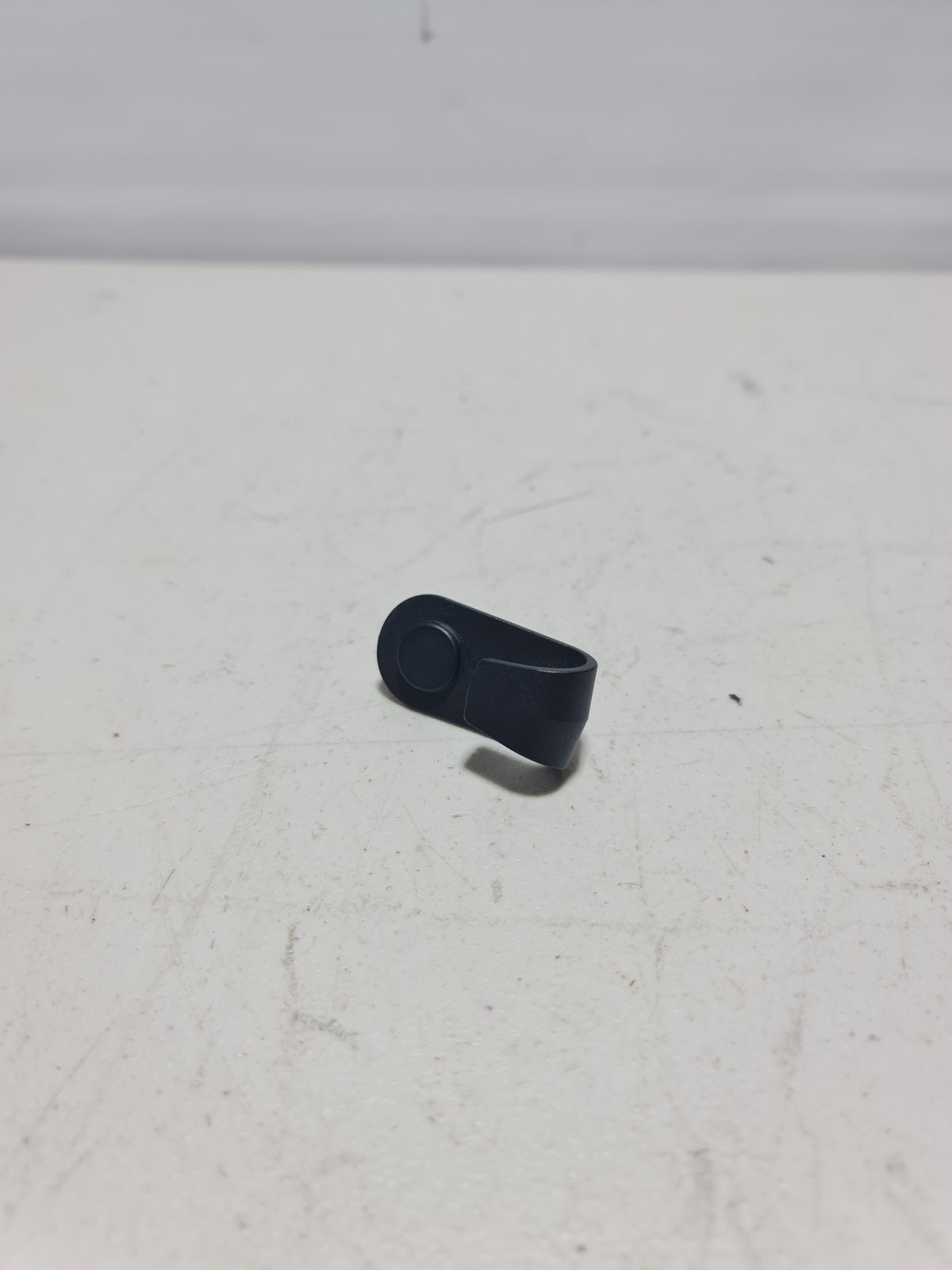 BMW trunk side trim hook for 2010-2020 models, black plastic interior trim accessory with mounting hook.