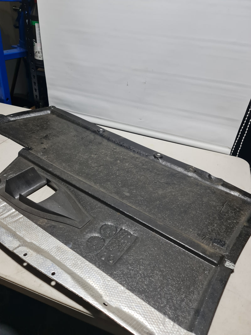 BMW M4 F82 2014 underbody splash guard panel, center underfloor coating, automotive part for vehicle protection.