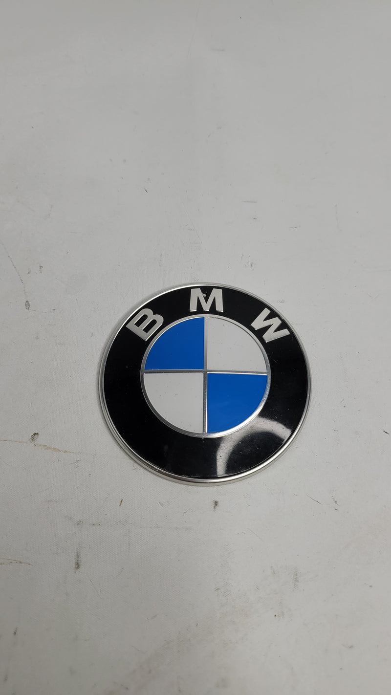 BMW front bumper emblem by MPerformance.parts, showcasing the sleek design and logo for BMW vehicle front bumper.