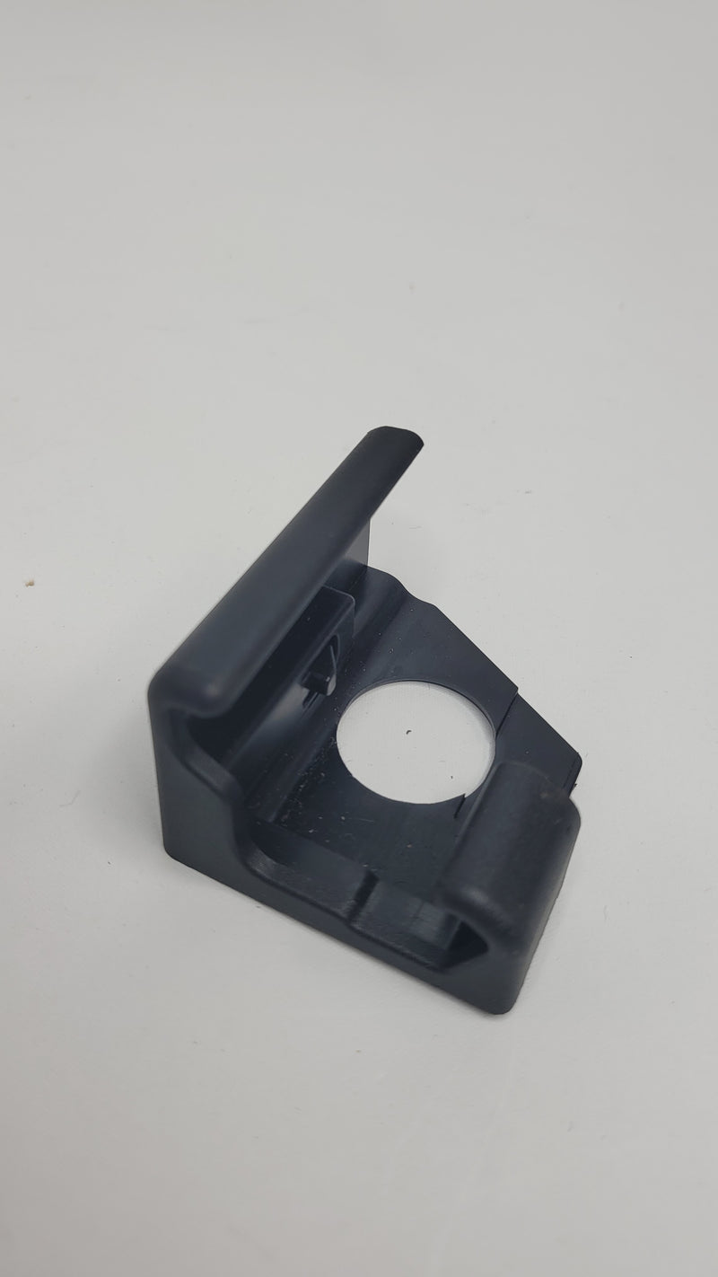 BMW G80 G82 M3 M4 right seat rail cover by MPerformance.parts, showing the black plastic cover for the seat rail.