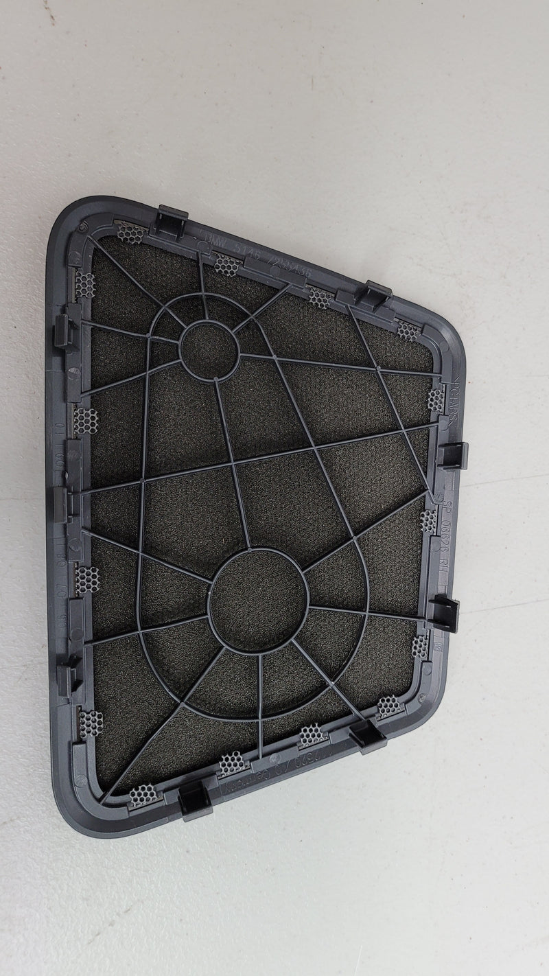 BMW G80 M3 rear right upper deck shelf speaker cover by MPerformance.parts, close-up of black plastic interior component.