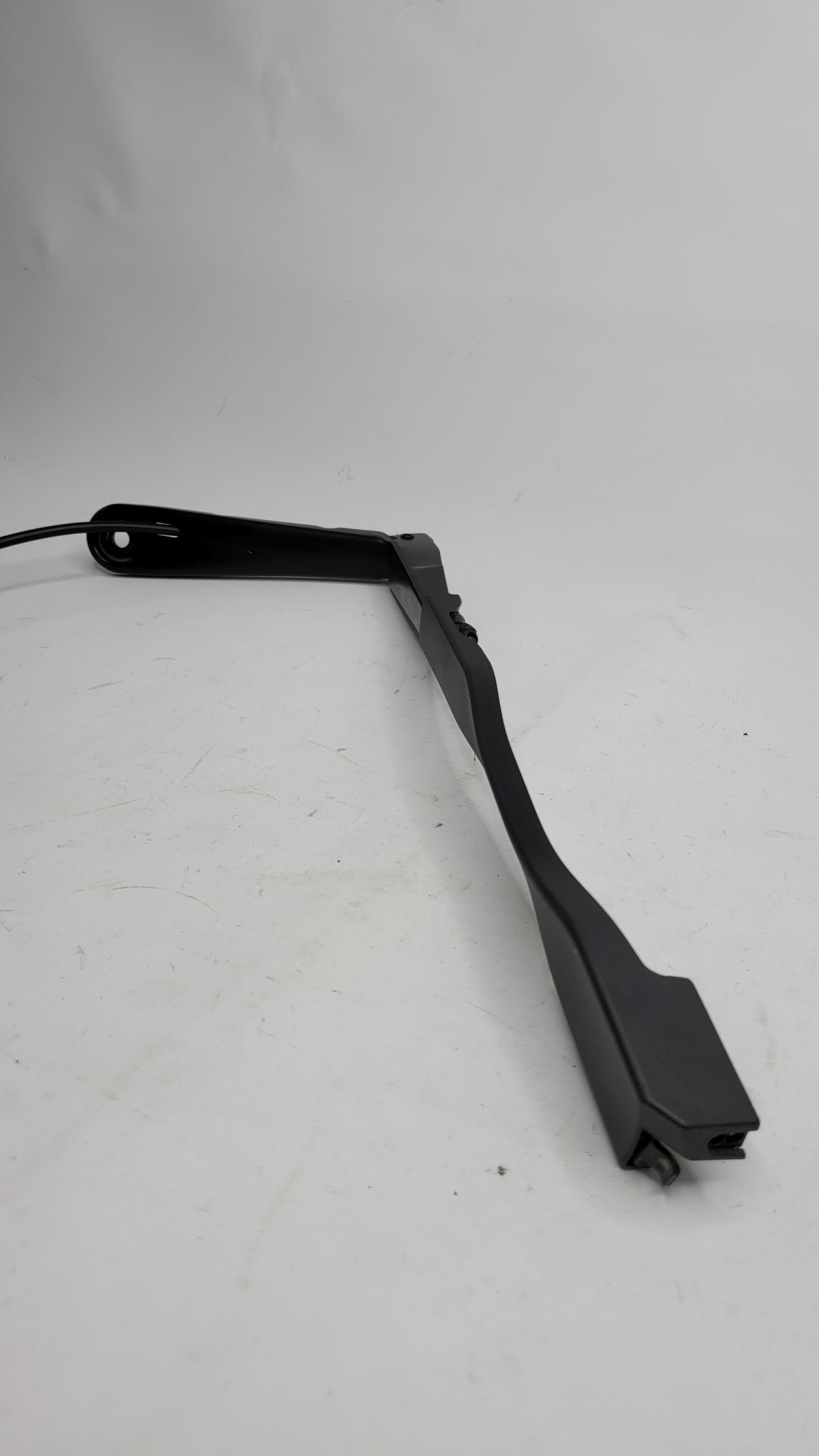 BMW G80 driver side right wiper arm for windshield, MPerformance.parts, showing the black metal wiper arm with mounting hardware.