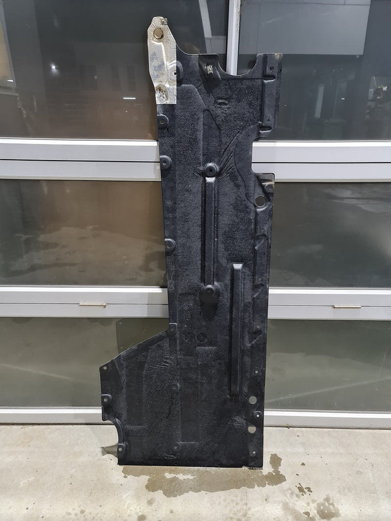 BMW M2 M3 M4 F80 F82 F83 F87 under body paneling undertray right side by MPerformance.parts, close-up view of the part.