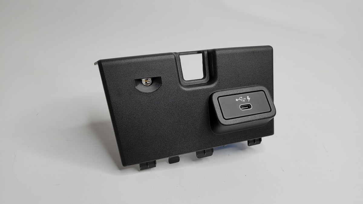BMW M3 G80 center console insert trim with integrated USB port, made by MPerformance.parts, shown in the image.