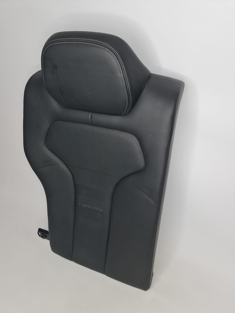 BMW M3 F80 OEM black leather rear seat assembly showing plush leather upholstery and seat contours for the BMW M3 F80.
