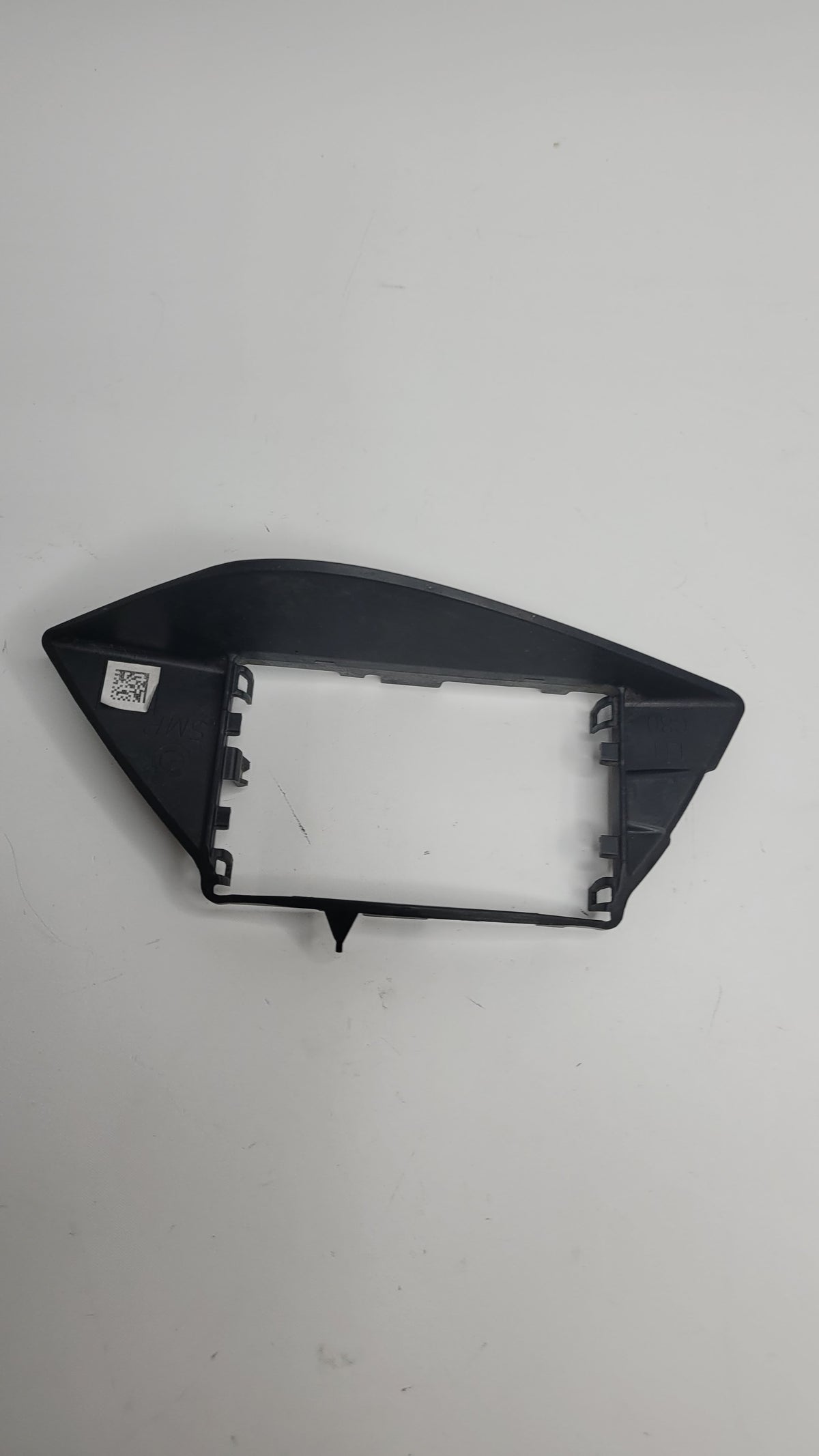 BMW M3 G80 M3 rear left bumper absorber funnel, part 51129882373, showing the black plastic component installed on the vehicle.