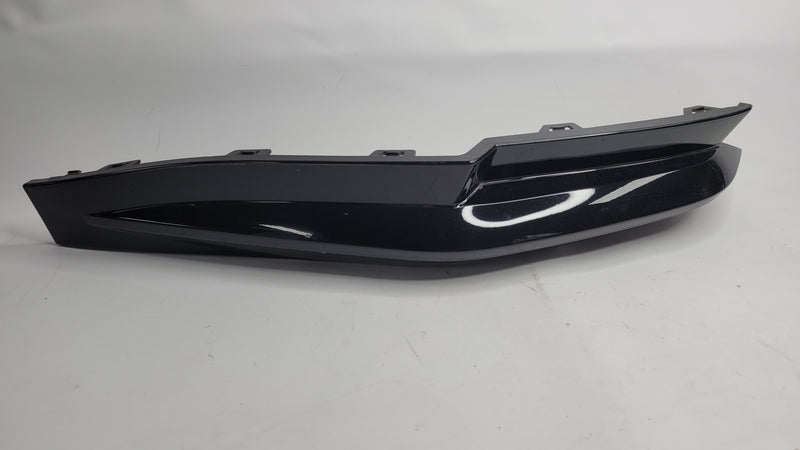 BMW M3 G80 rear left lower bumper diffuser insert by MPerformance.parts, showing the sleek black aerodynamic design.