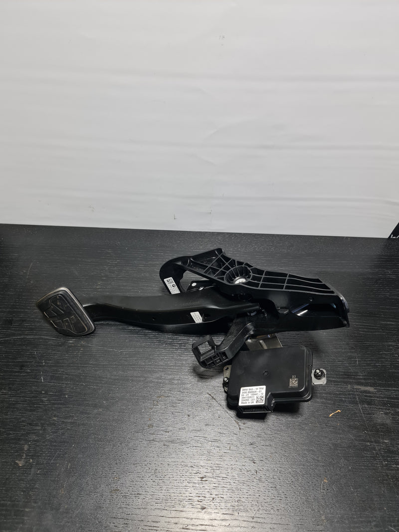 BMW M3 G80 SAS control module and brake pedal by MPerformance.parts, showing the unit and pedal components.