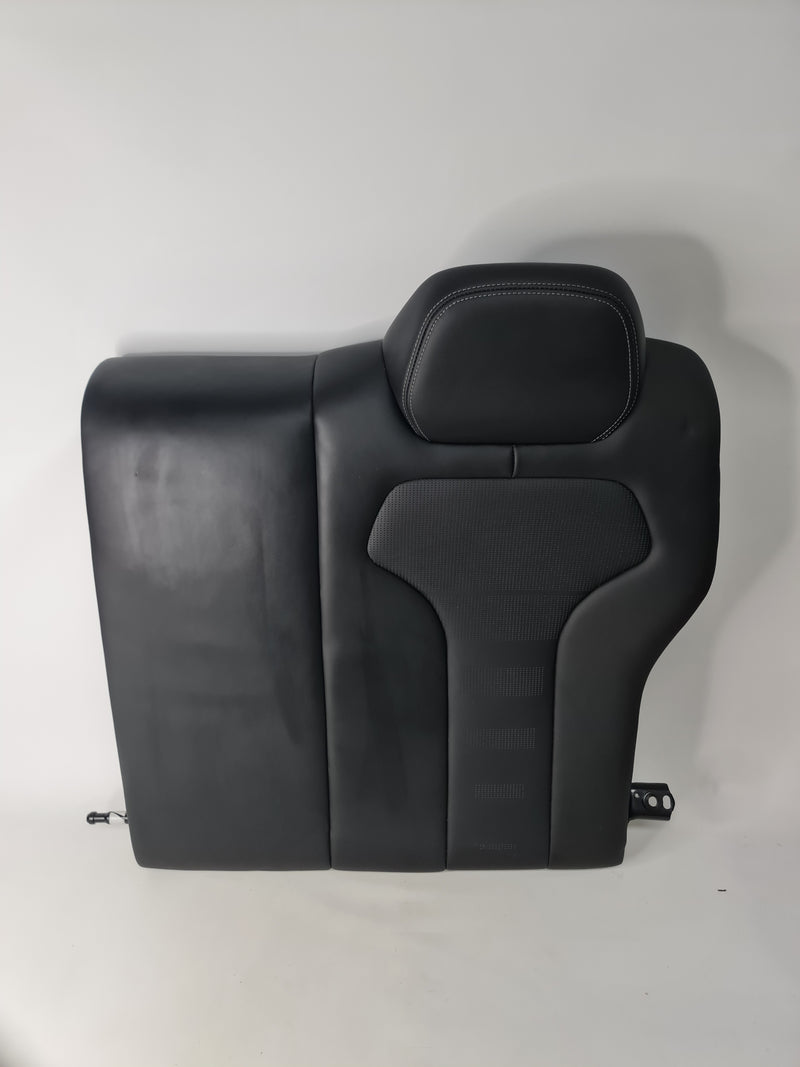 BMW M4 F82 OEM black leather rear seat assembly showing plush leather upholstery and seat contours in a clean car interior.
