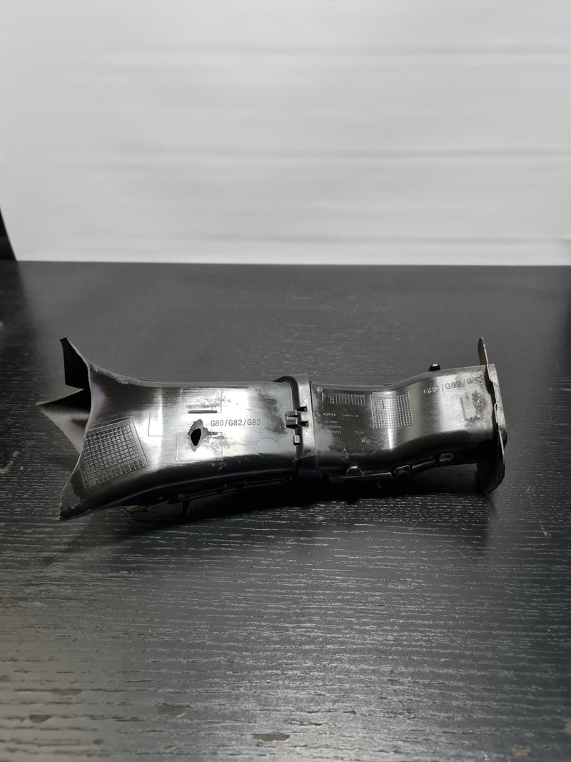 BMW M4 G82 G83 left N/S brake air intake duct by MPerformance.parts, showing the black plastic component for improved airflow.