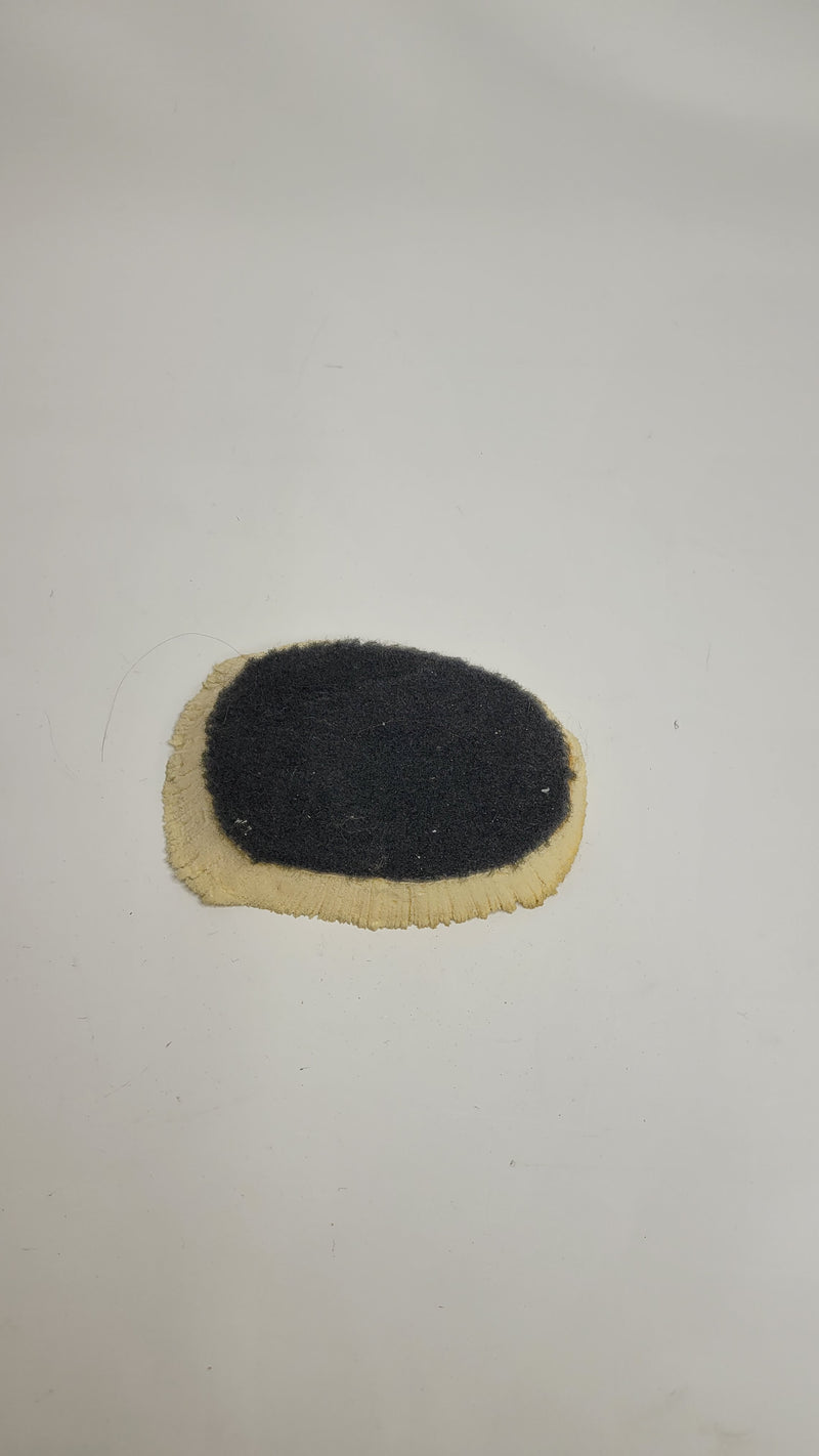 F80 M3 center tunnel carpet piece from MPerformance.parts, showing textured black fabric with detailed stitching.