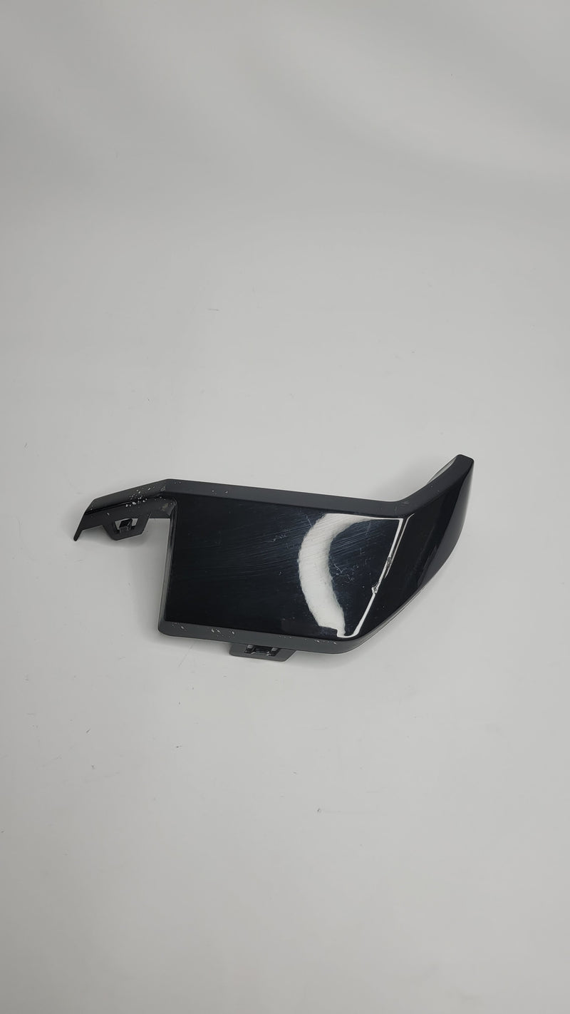 BMW M3 M4 G80 G82 rear bumper right diffuser corner trim molding by MPerformance.parts, close-up view of the black plastic component.