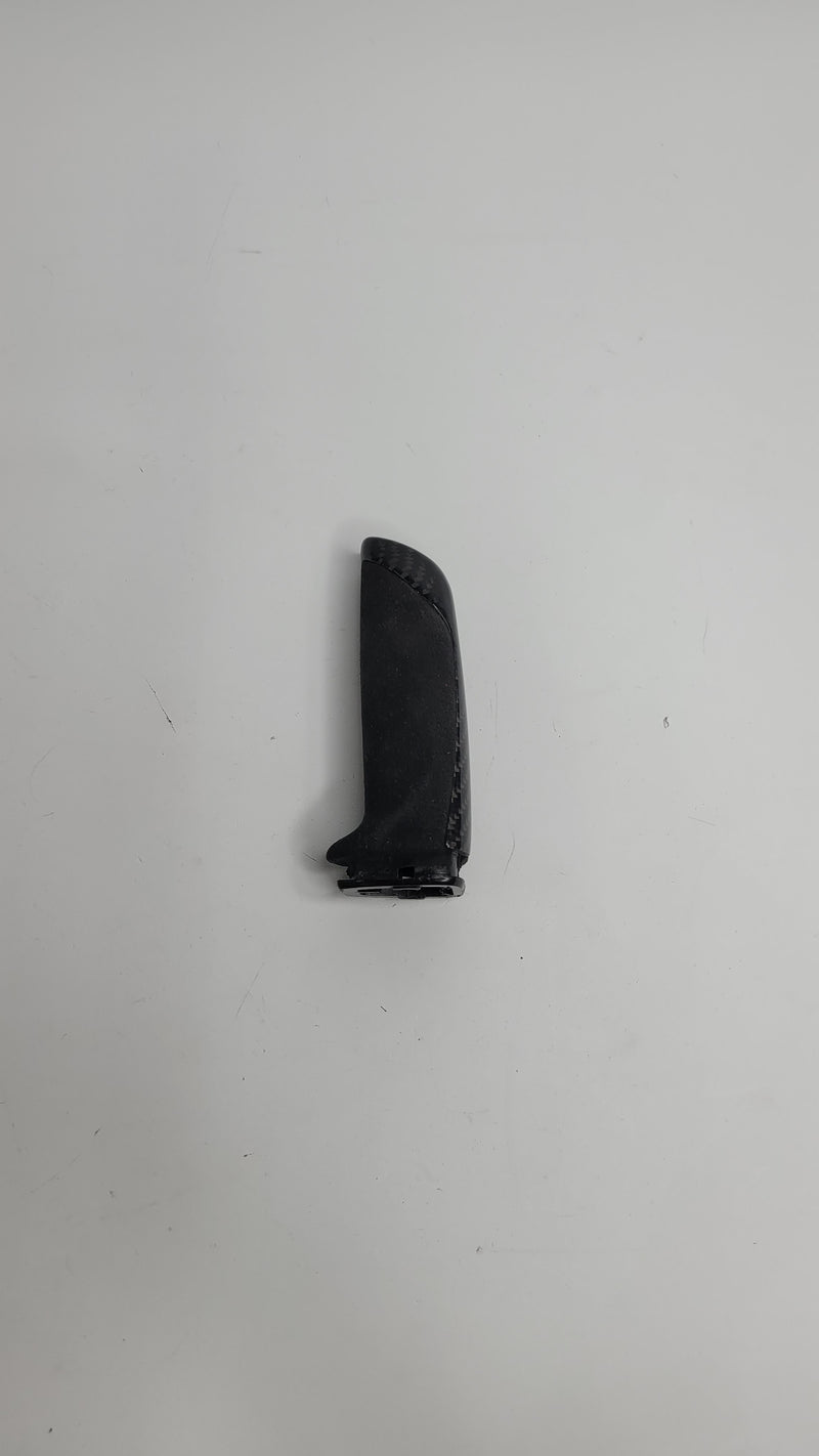 BMW F8x M2 M3 M4 M Performance carbon fiber and Alcantara parking hand brake handle lever, detailed view showing material textures.