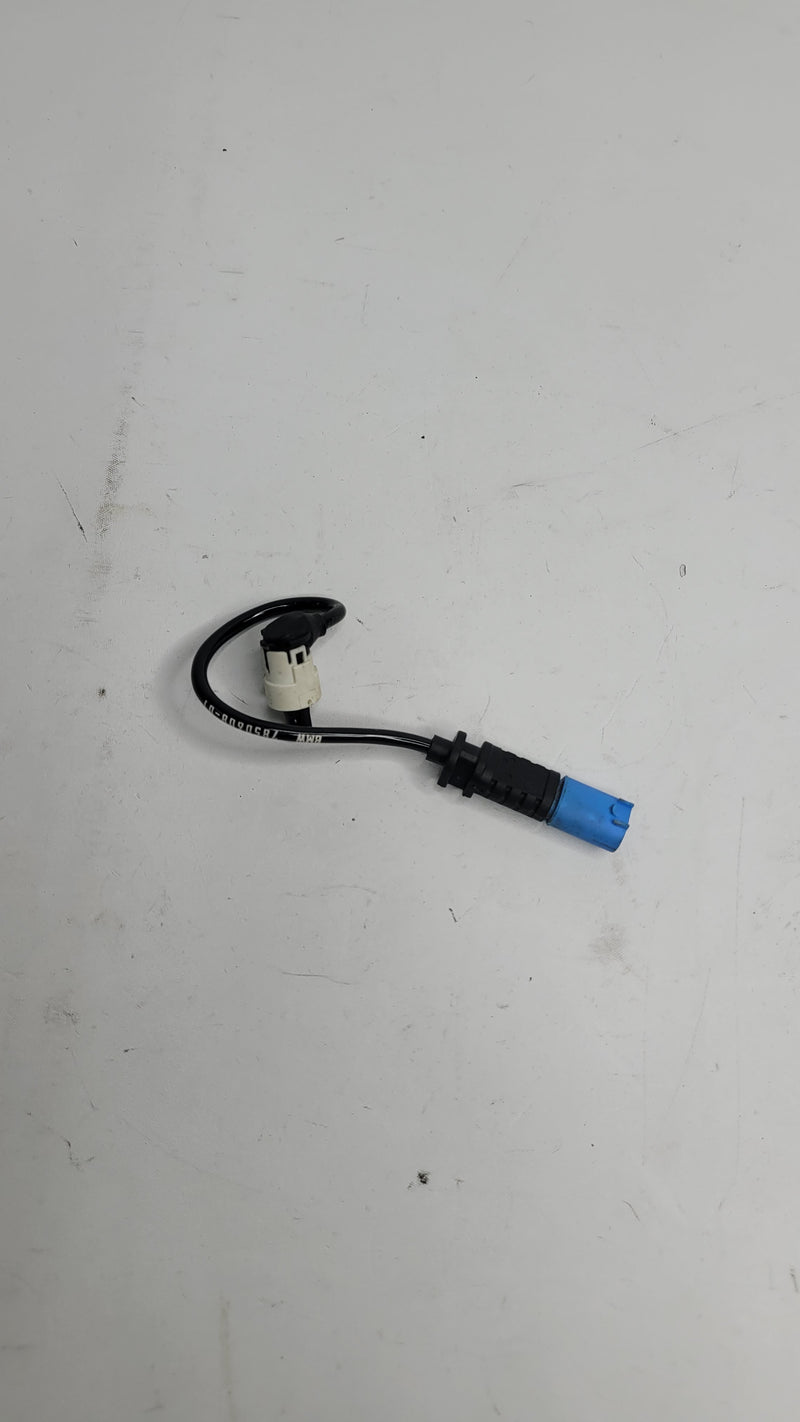 BMW F8x Adapter Cable Edc by MPerformance.parts, compatible with BMW models, showing the black connector and cable.