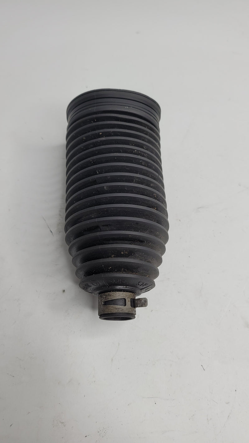 BMW F80 tie rod boot by MPerformance.parts, close-up of the black rubber cover for steering component protection.