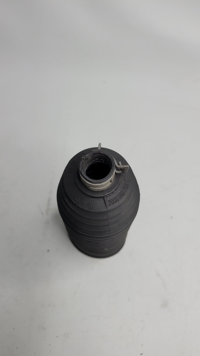 BMW F80 tie rod boot from MPerformance.parts, close-up image showing the black rubber cover for steering components.