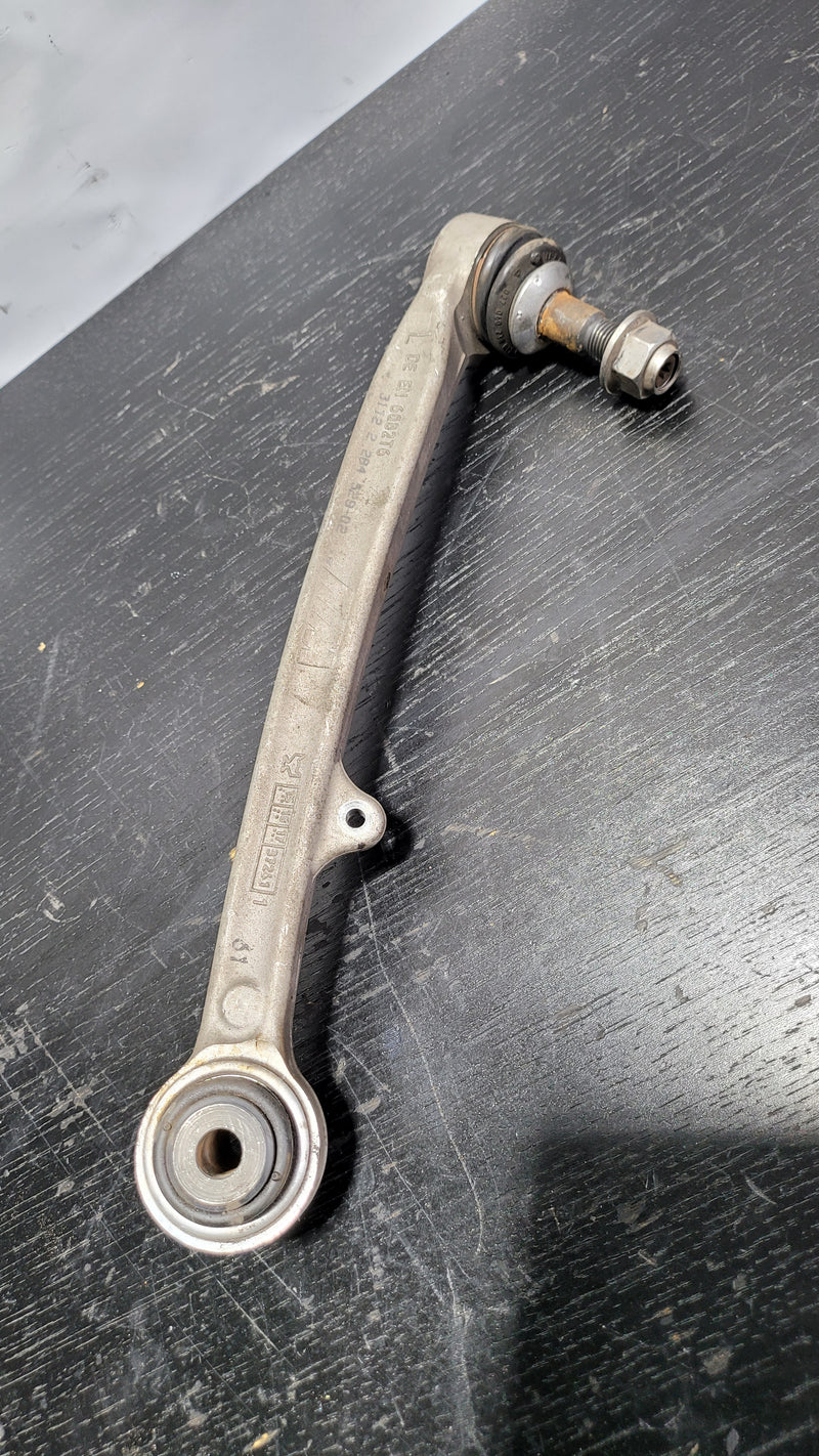 F80 BMW left front control arm made of 6082T6 aluminum by MPerformance.parts, showing the control arm with mounting points.