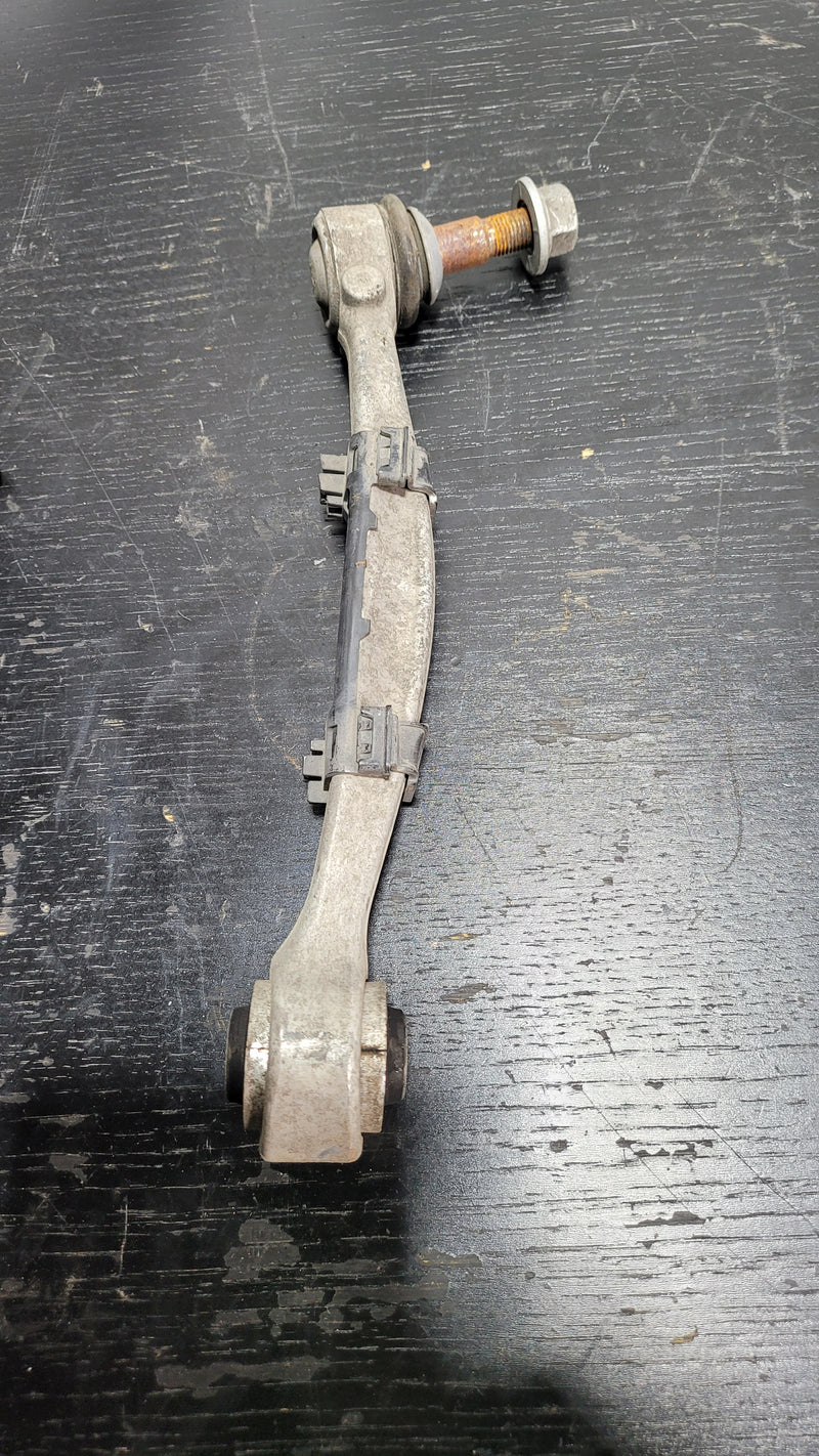 979A3 F80 M3 rear control arm by MPerformance.parts, showing the metal component with mounting points and bushings for BMW F80 M3.