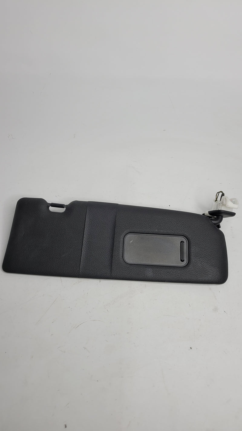 BMW MPerformance.parts left visor without label, model 8057937, showing the sleek black design and mounting clips.